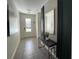 Bright and spacious entryway with tile flooring and modern decor at 1799 Caribbean View Ter, Kissimmee, FL 34747