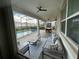 Covered patio overlooking the pool and backyard at 1799 Caribbean View Ter, Kissimmee, FL 34747