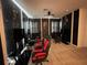 Gaming room with multiple gaming chairs and TVs at 1799 Caribbean View Ter, Kissimmee, FL 34747