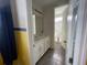 Shared bathroom with double vanity and shower at 1799 Caribbean View Ter, Kissimmee, FL 34747