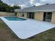 Inviting backyard oasis featuring a refreshing pool and expansive patio area at 2118 Allspice Ave, Orlando, FL 32837