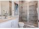 Clean bathroom with a walk-in shower and modern vanity at 2133 Pine Oak Loop, Davenport, FL 33837