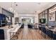 Open concept living room and kitchen with modern decor at 2133 Pine Oak Loop, Davenport, FL 33837