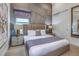 Spacious bedroom with a comfortable bed and neutral color palette at 2133 Pine Oak Loop, Davenport, FL 33837