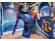 ' playroom with a unique slide and nautical-themed decor at 2133 Pine Oak Loop, Davenport, FL 33837