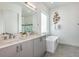Modern bathroom with double vanity, soaking tub, and walk-in shower at 2133 Pine Oak Loop, Davenport, FL 33837