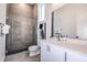 Modern bathroom with white vanity and a large walk-in shower at 2133 Pine Oak Loop, Davenport, FL 33837