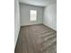 Well-lit bedroom with neutral carpeting and a window at 2720 Pierr St, Davenport, FL 33837