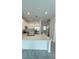Modern kitchen with stainless steel appliances and island at 2720 Pierr St, Davenport, FL 33837