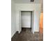 Neat closet with hanging rod and neutral carpeting at 2720 Pierr St, Davenport, FL 33837