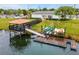 Community dock with kayaks and a covered pavilion at 3004 Ballad Rd, Kissimmee, FL 34746