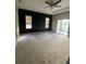 Large main bedroom with dark accent wall and carpet at 3077 Brenton Manor Loop, Winter Haven, FL 33881