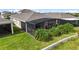 Screened patio with lush landscaping and grilling area at 5075 Twin Lakes Blvd, St Cloud, FL 34772