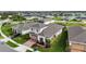 Two-story home with two-car garage and landscaped yard at 5075 Twin Lakes Blvd, St Cloud, FL 34772