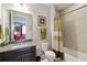 Clean bathroom with granite vanity, tub, and shower at 5075 Twin Lakes Blvd, St Cloud, FL 34772