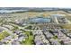 Wide aerial view of a lakefront residential neighborhood at 5075 Twin Lakes Blvd, Saint Cloud, FL 34772