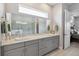 Double vanity bathroom with gray cabinets and quartz countertop at 5075 Twin Lakes Blvd, St Cloud, FL 34772