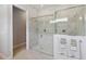 Large walk-in shower with marble tile and glass enclosure at 5075 Twin Lakes Blvd, St Cloud, FL 34772