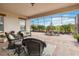 Spacious covered patio with wicker furniture and paver floor at 5075 Twin Lakes Blvd, St Cloud, FL 34772