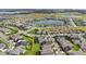 Wide aerial view of a lakefront residential neighborhood at 5075 Twin Lakes Blvd, St Cloud, FL 34772