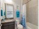Small bathroom with a single vanity and shower/tub combo at 5075 Twin Lakes Blvd, St Cloud, FL 34772