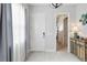 Bright entryway with gray walls and wood-look floors at 5075 Twin Lakes Blvd, St Cloud, FL 34772