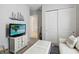 Bright bedroom with built-in shelving and comfortable seating at 5075 Twin Lakes Blvd, St Cloud, FL 34772