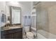 Small bathroom with a single vanity, toilet and tub at 5075 Twin Lakes Blvd, Saint Cloud, FL 34772