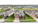 Two-story home with two-car garage and landscaped yard at 5075 Twin Lakes Blvd, St Cloud, FL 34772