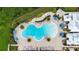 Large freeform community pool with surrounding lounge area at 5075 Twin Lakes Blvd, St Cloud, FL 34772