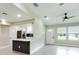 Open living room with kitchen island and modern design at 639 Shore Acres Dr, Lakeland, FL 33801