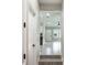 Hallway with tile floors and access to living areas at 639 Shore Acres Dr, Lakeland, FL 33801