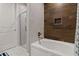 Clean bathroom with soaking tub and walk-in shower at 7585 Sunny Dreams Ln, Kissimmee, FL 34747