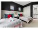 Mickey Mouse themed bedroom with two twin beds and ensuite bathroom at 7585 Sunny Dreams Ln, Kissimmee, FL 34747