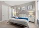 Spacious bedroom with king-size bed, nightstands, and plenty of natural light at 7585 Sunny Dreams Ln, Kissimmee, FL 34747
