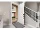 Interior view showing entryway with staircase and front door at 7585 Sunny Dreams Ln, Kissimmee, FL 34747