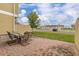 Brick patio with seating area, perfect for outdoor dining and entertaining at 7585 Sunny Dreams Ln, Kissimmee, FL 34747