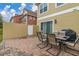 Patio with seating area and grill, great for outdoor entertaining at 7585 Sunny Dreams Ln, Kissimmee, FL 34747