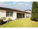 Well-maintained house exterior with a large backyard at 7845 Wandering Way, Orlando, FL 32836