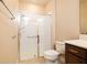 Bathroom with walk-in shower and modern vanity at 7845 Wandering Way, Orlando, FL 32836
