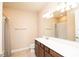 Bathroom with double vanity and shower/tub combo at 7845 Wandering Way, Orlando, FL 32836