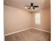 Bedroom with ceiling fan and window blinds at 7845 Wandering Way, Orlando, FL 32836