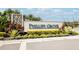 Phillips Grove community entrance sign with landscaping at 7845 Wandering Way, Orlando, FL 32836