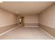 Spacious living room with neutral wall colors and carpeting at 7845 Wandering Way, Orlando, FL 32836