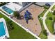 Community playground with swings, slides, and play structures at 7845 Wandering Way, Orlando, FL 32836