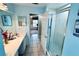 Clean bathroom with double vanity and large walk-in shower at 1779 Lisa Ln, Kissimmee, FL 34744