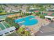 Resort-style pool with lounge chairs and tennis courts at 247 Travis Ln, Davenport, FL 33837