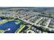 Aerial showing home near lake in a residential community at 247 Travis Ln, Davenport, FL 33837