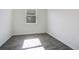 Bright bedroom with dark gray tile floor at 2971 Camden Way, Davenport, FL 33837