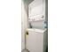 Stackable washer and dryer in a small laundry room at 2971 Camden Way, Davenport, FL 33837